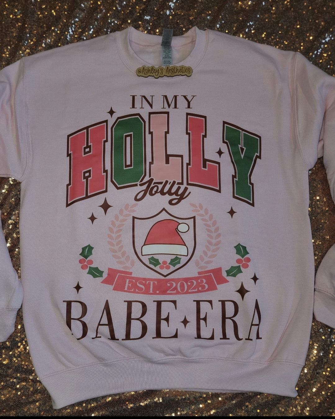 In My Holly Jolly Babe Era Baby Pink Crewneck Sweater